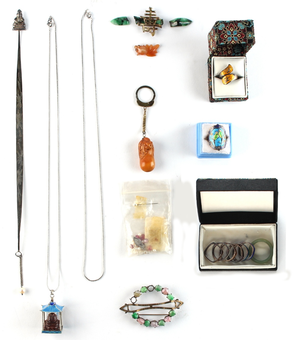 Property of a lady - a bag containing assorted items including Chinese jewellery (a lot) (see