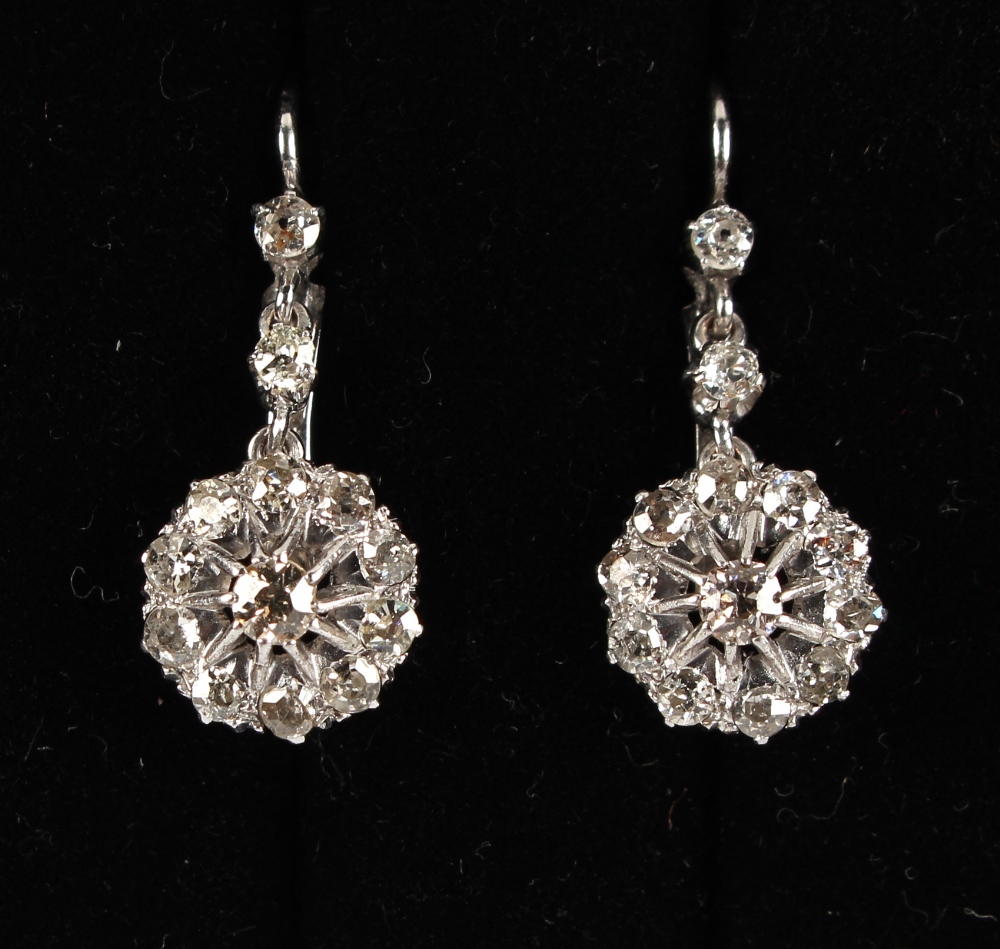 A pair of diamond cluster pendant earrings, the estimated total diamond weight 1.4 carats (2) (see