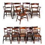 Property of a gentleman - a matched set of fifteen late 19th / early 20th century elm seated