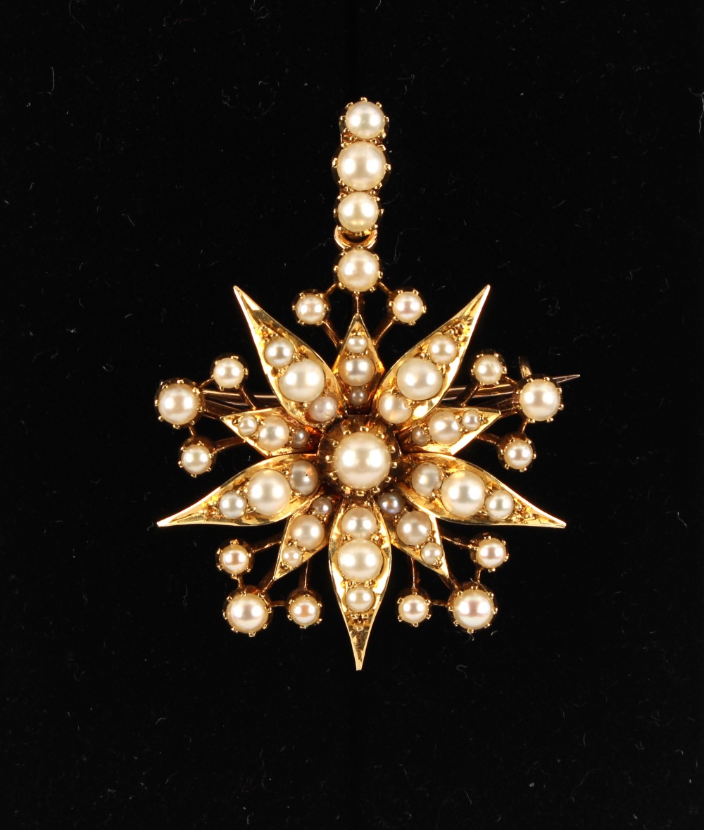 A late 19th / early 20th century yellow gold & seed pearl star brooch or pendant, 1.7ins. (4.