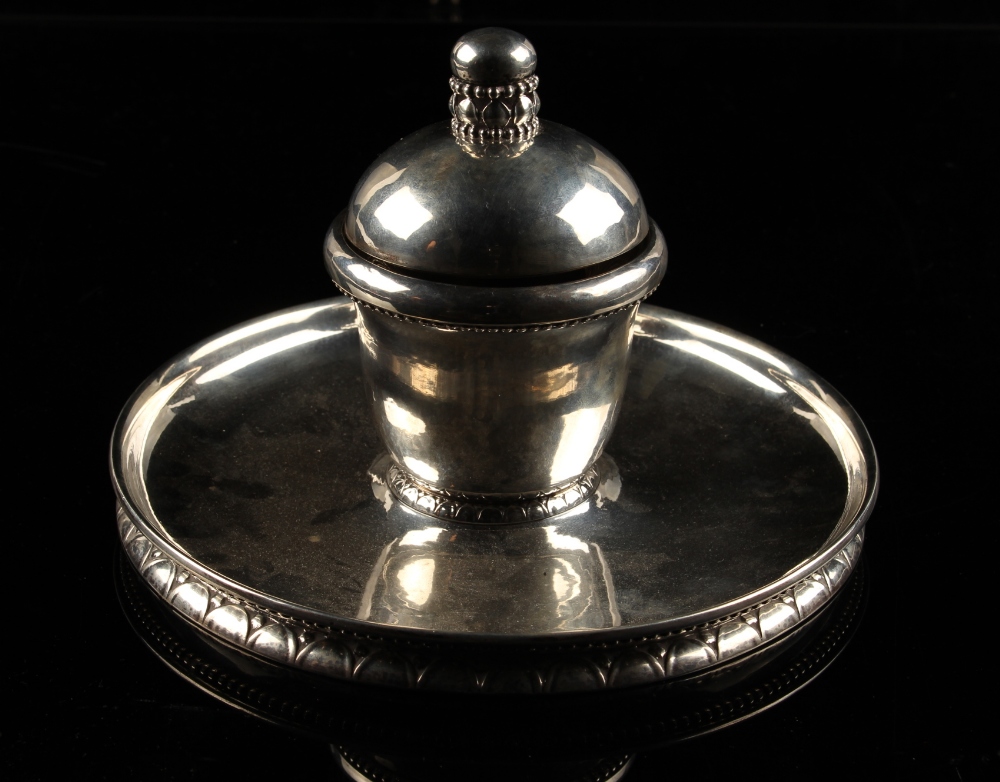 A large early 20th century Georg Jensen silver inkwell, pattern number 150, dated 1919, 8.1ins. (