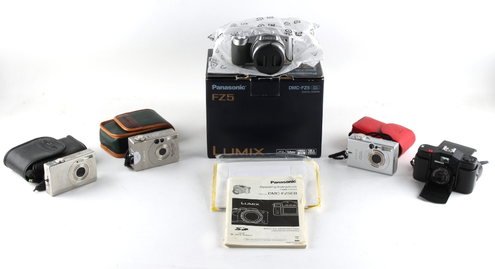 Property of a deceased estate - a boxed Panasonic Lumix DMC-FZ5 digital camera; together with a