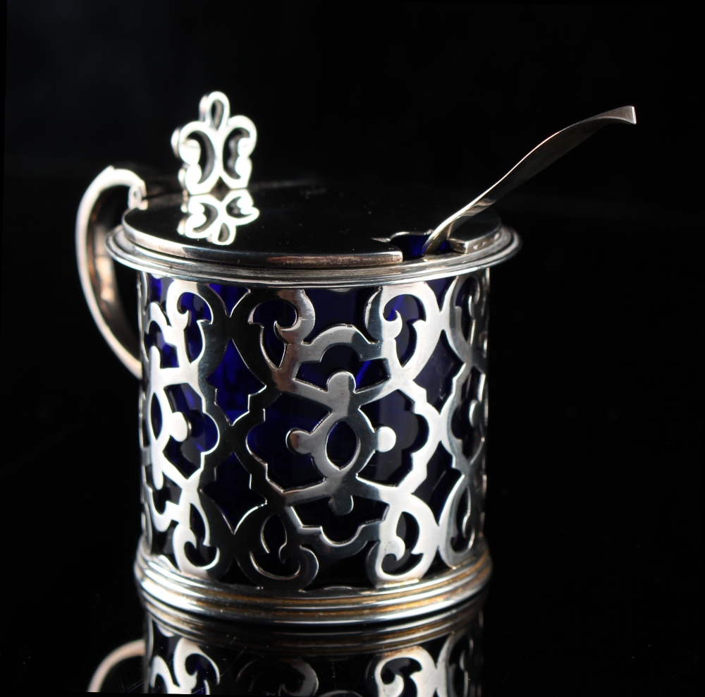 Property of a gentleman - a Victorian pierced silver drum mustard pot, with blue glass liner, London