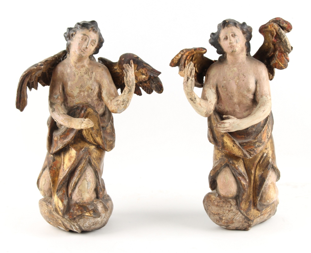 Property of a lady - a pair of carved & painted limewood figures of angels, probably German or