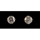 A pair of 18ct yellow gold diamond solitaire stud earrings, the estimated total diamond weight 0.4