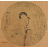 A late 19th century Chinese painting on circular silk panel depicting a lady by bamboo, with