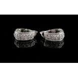 A pair of good quality Chopard 18ct white gold diamond earrings, with heart decorated settings, each