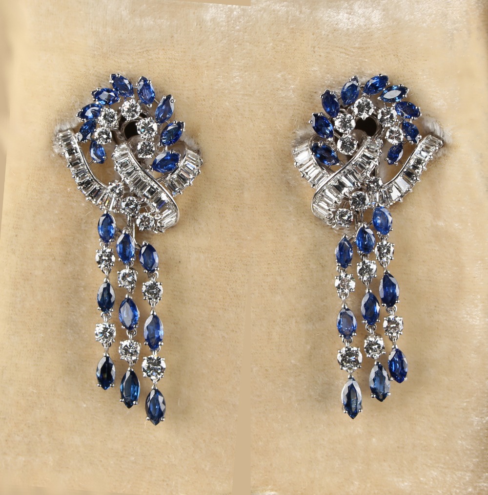 A very fine pair of 18ct white gold & platinum sapphire & diamond earrings, the navette cut