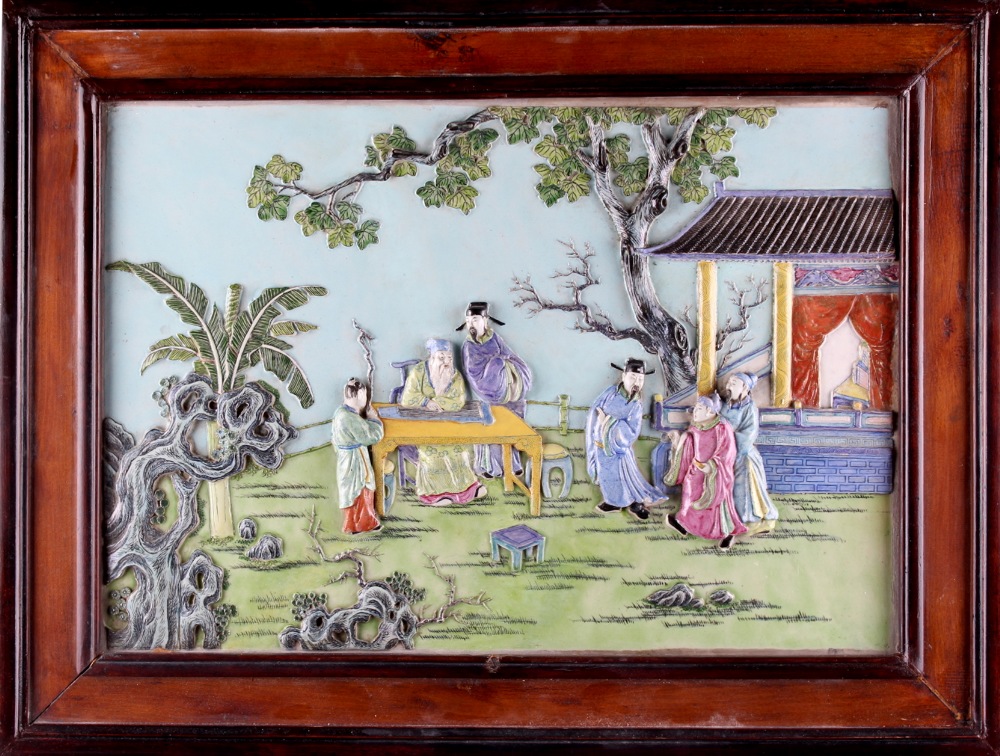 A Chinese porcelain relief moulded rectangular plaque, probably 19th century, decorated with six