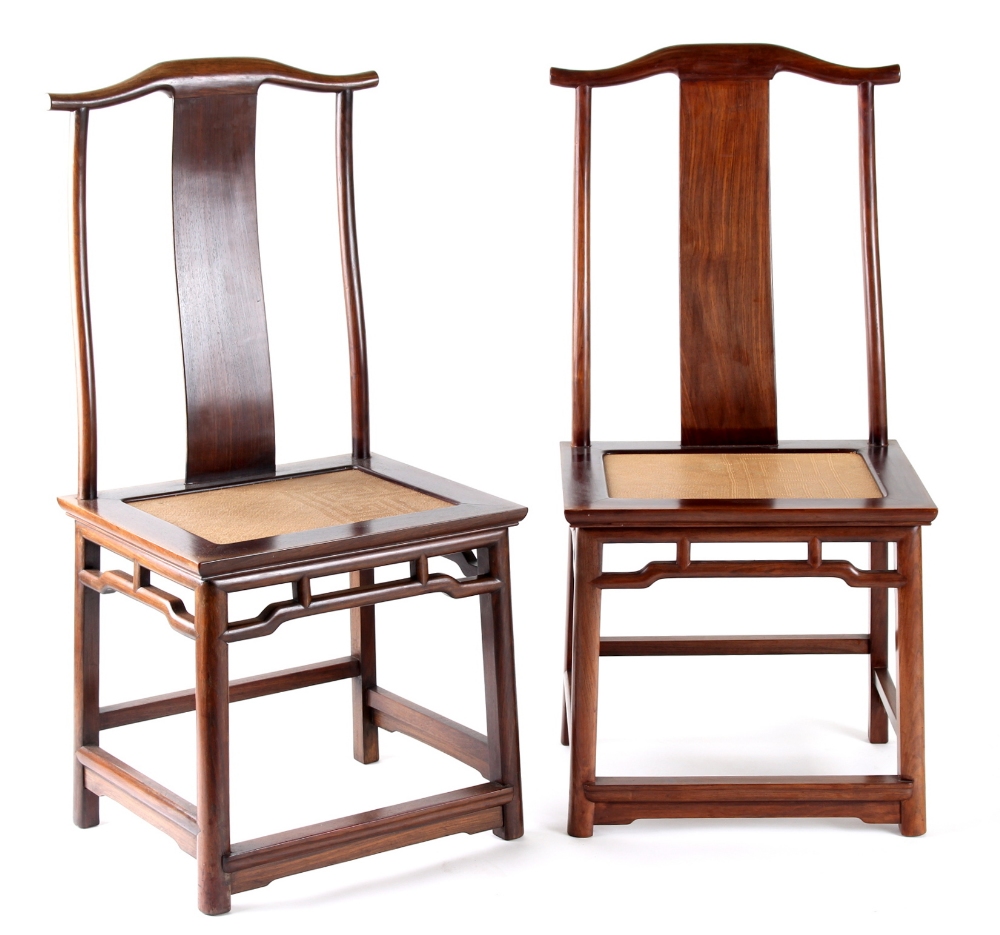 A pair of Chinese hongmu official's hat chairs, probably early 20th century, with woven seats (2) (