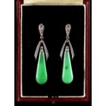 A pair of Art Deco style jadeite, black onyx & diamond pendant earrings, each 2.05ins. (5.2cms.)