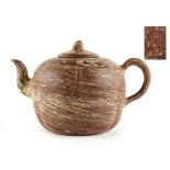 A Chinese Yixing agateware teapot, of hexagonal lobed form, two indistinct seal marks to base, 4.