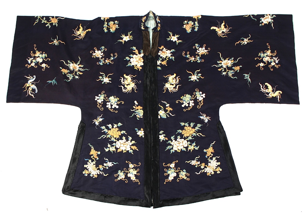 A Chinese embroidered navy blue silk robe, with scattered butterflies & flowers, with black
