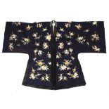 A Chinese embroidered navy blue silk robe, with scattered butterflies & flowers, with black