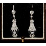 A pair of Art Deco black onyx & diamond pendant earrings, the estimated total diamond weight 2.90