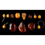 A bag containing amber nuggets & beads, approximately 129 grams (see illustration).