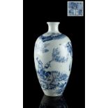 Property of a gentleman - a Chinese iron red decorated blue & white vase, well painted with a figure