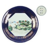 Property of a gentleman - a Chinese gilt decorated powder blue ground charger, painted with