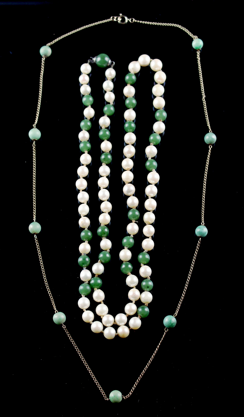 Property of a lady - a 9ct gold & jadeite bead necklace, 26.75ins. (68cms.) long; together with a