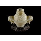 Property of a gentleman - a fine Chinese carved & reticulated greyish white jade censer & cover,