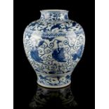 A large Chinese blue & white baluster vase, painted with the Eight Immortals between bands of cranes