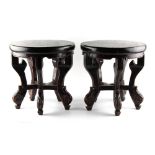 A pair of early 20th century Chinese wooden stands, each 13.8ins. (35cms.) high (2) (see