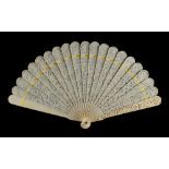 A 19th century Chinese Canton carved ivory brisee fan, 7.4ins. (18.7cms.) long (see illustration).