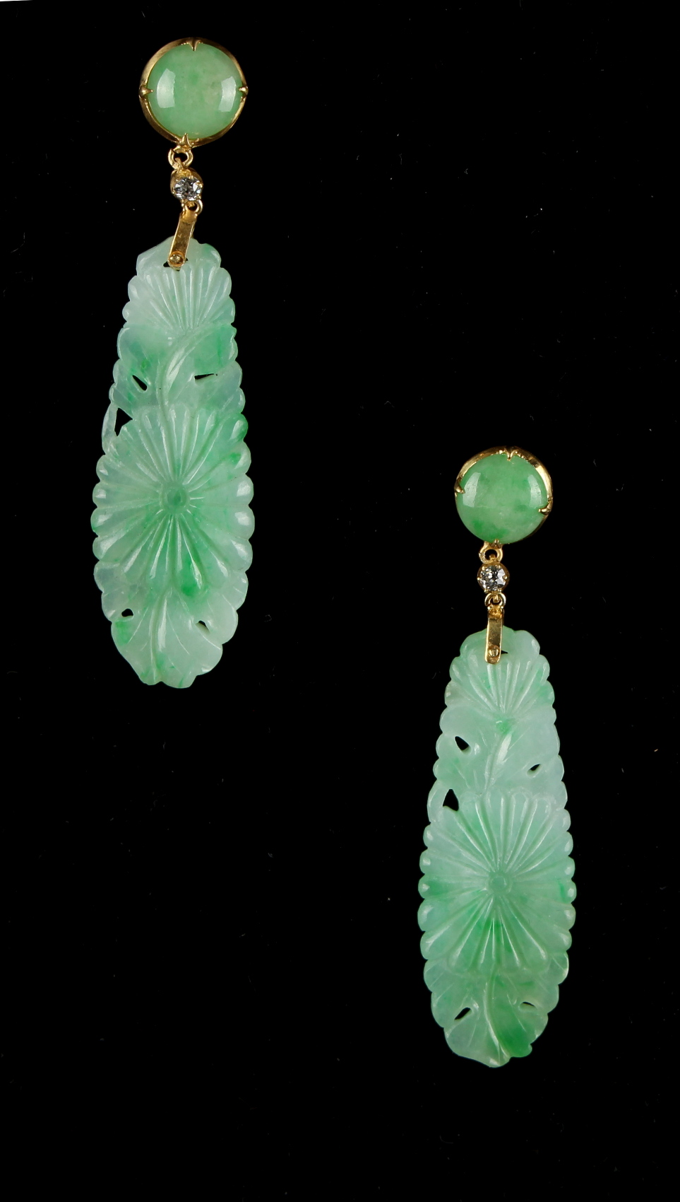 A pair of jadeite & diamond pendant earrings, each with a carved & pierced jadeite drop suspended