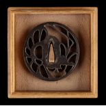 Property of a gentleman - a Japanese Akasaka iron tsuba, Edo period (1615-1868), with openwork