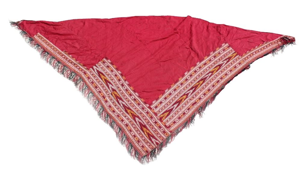 Property of a deceased estate - an Afghan red cotton shawl with flat-weave decoration (see
