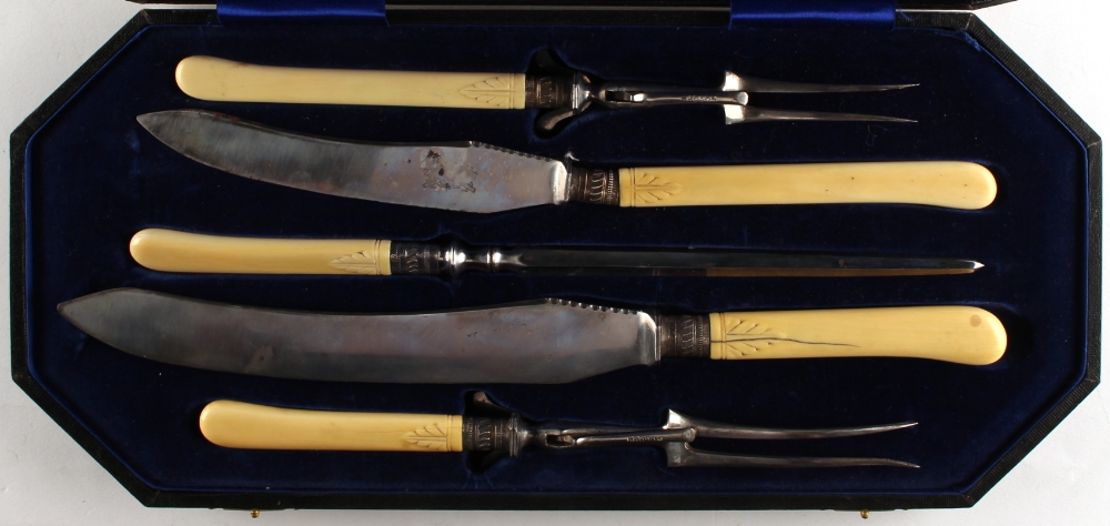 Property of a gentleman - an early 20th century cased five piece carving set with carved ivory