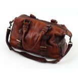 Property of a deceased estate - a Russell & Bromley brown leather bag (see illustration).