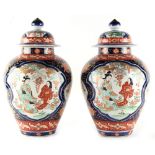 Property of a lady - a pair of late 19th century Japanese Imari vases & covers, each 12.6ins. (