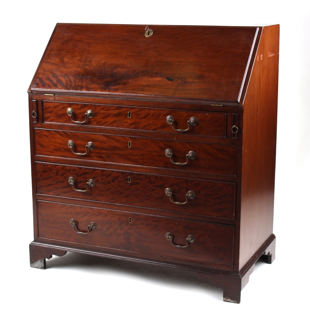 Property of a gentleman - an early 19th century George III mahogany fall-front bureau, with four