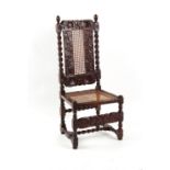 Property of a lady - a late 17th century carved walnut & cane panelled high back chair, restorations