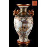 A late 19th / early 20th century Japanese Kutani baluster vase, with karashishi handles, seal mark