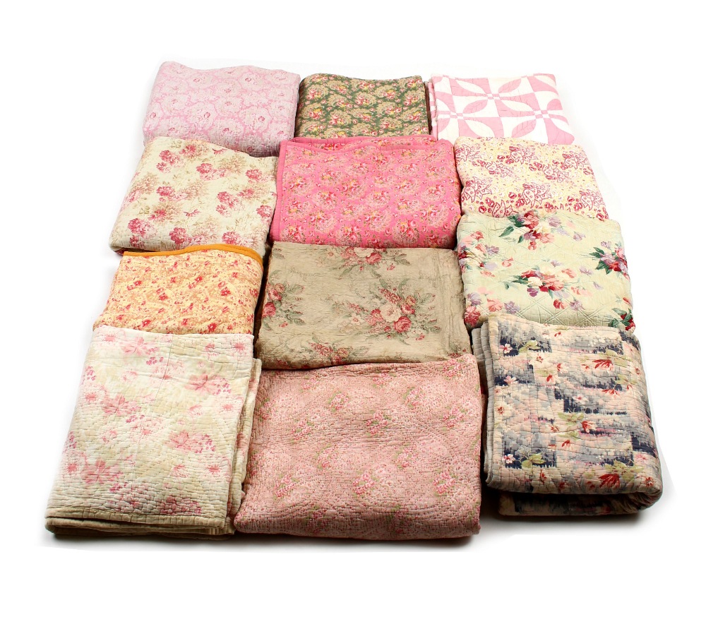 Property of a deceased estate - a collection of twelve floral quilts (12) (see illustration).