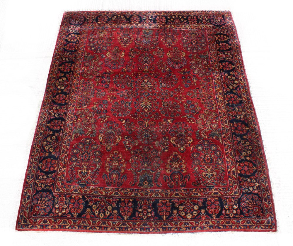 Property of a lady - an early 20th century Persian Sarouk carpet, of 'American Sarouk' design, 135