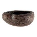 Property of a lady - a 19th century Persian Qajar carved coco de mer begging bowl, kashkul, carved