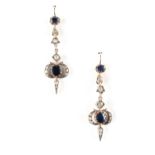 Property of a lady of title - a pair of early 20th century sapphire & diamond pendant earrings, each