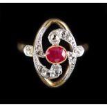 An unmarked yellow gold ruby & diamond ring, with central oval cut ruby weighing approximately 0.5