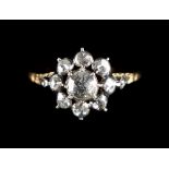 An unmarked yellow gold rose cut diamond cluster ring, the estimated total diamond weight 0.75