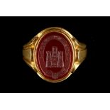 A good 18ct yellow gold carved carnelian oval intaglio signet ring, approximately 9.2 grams, size