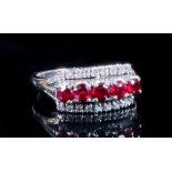 Property of a gentleman - an unmarked white gold ruby & diamond three row ring, approximately 4.7