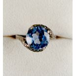 Property of a deceased estate - a synthetic large blue spinel ring, size P (see illustration).