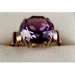 Property of a lady - an unmarked gold large synthetic pink sapphire ring, size M/N, boxed (see