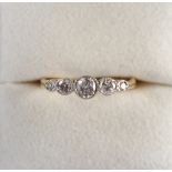 Property of a lady - an 18ct yellow gold & platinum diamond graduated five stone ring, the estimated