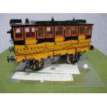 A Hornby Three and a Half Inch Gauge Rocket Coach, 'Liverpool Manchester', appears little used, some