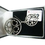 Ola Marie Gorie; A Scottish Hallmarked Silver Brooch, of stylised openwork design; together with