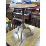 A Late XVIII Century Ash and Elm Pedestal Table, with a circular top, turned pedestal and cabriole